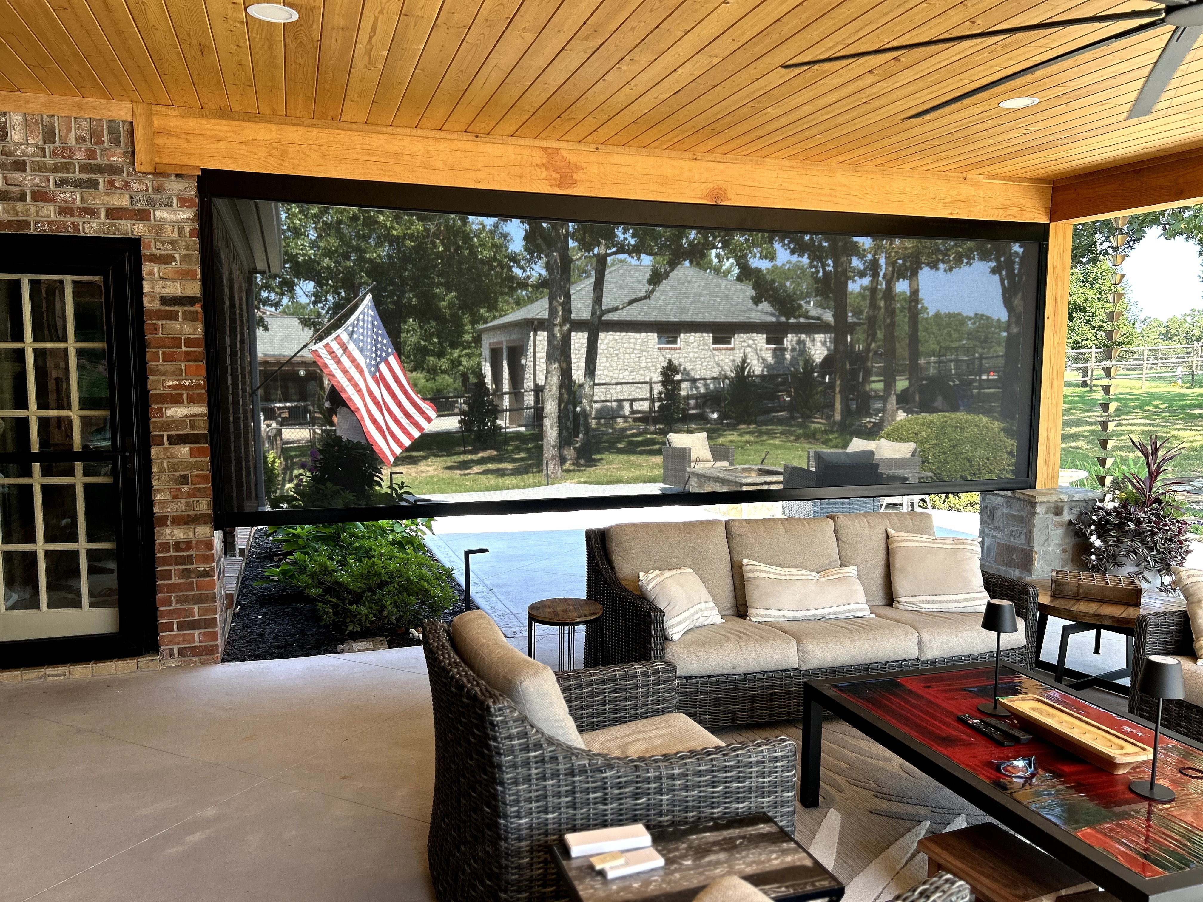 Motorized exterior screen — installed by our sister company, ShadeCo USA