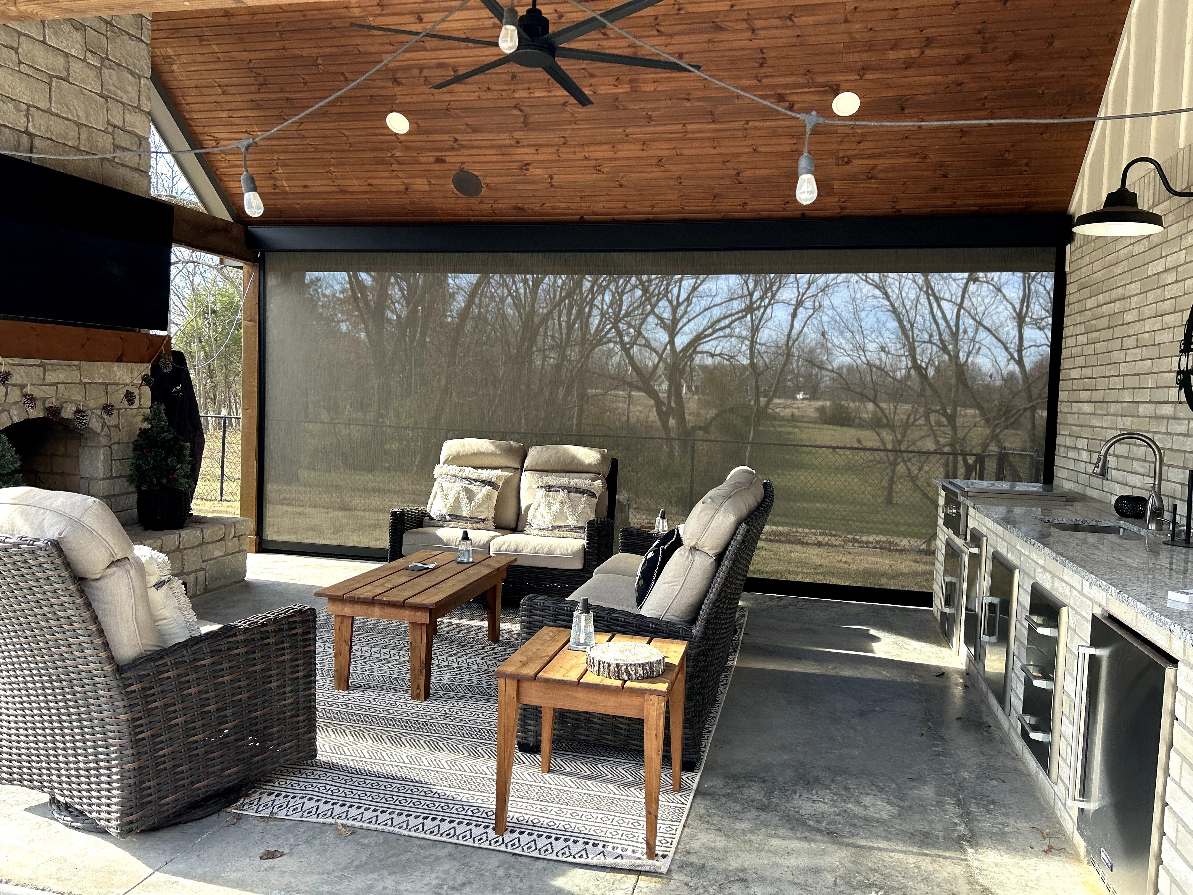 Motorized exterior screen — installed by our sister company, ShadeCo USA