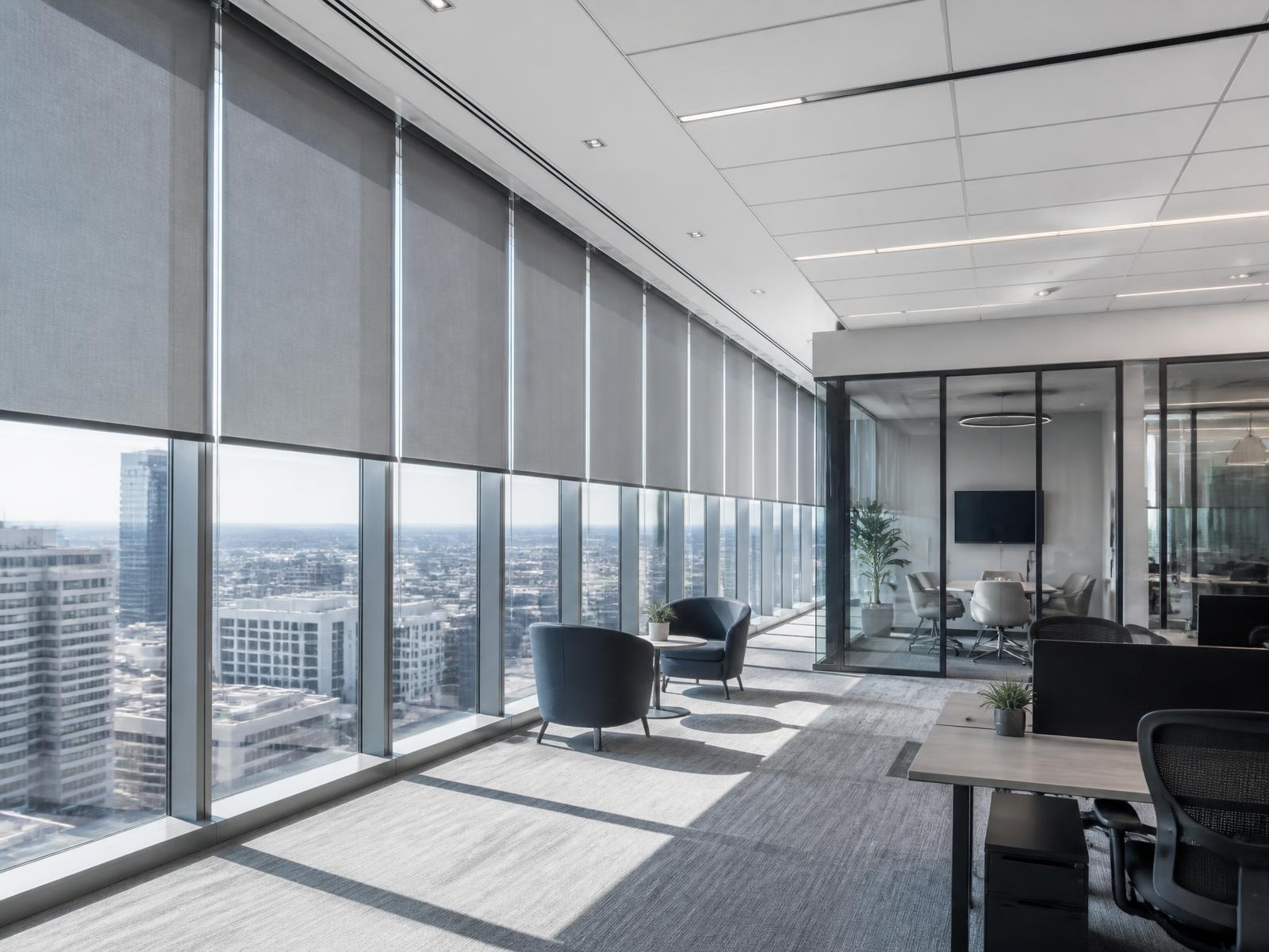 Office curtain wall with aligned motorized solar shades