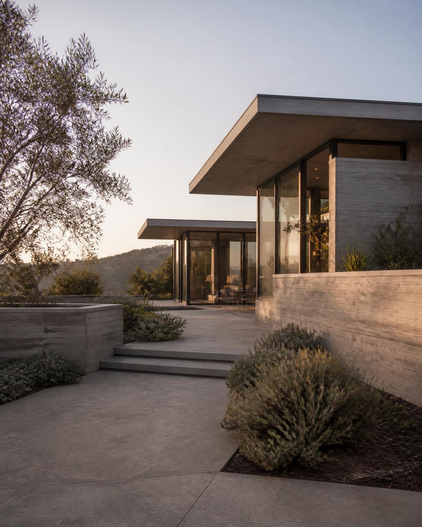 A glass and concrete hillside home in Southern California.
